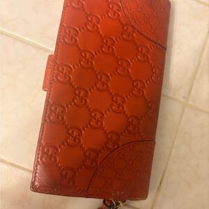 Gucci Orange Embossed Leather wallet